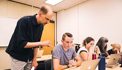 Thane Erickson interacting with one of the students in his classroom